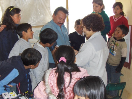 The kids curiously watching as I take their teacher´s blood pressure